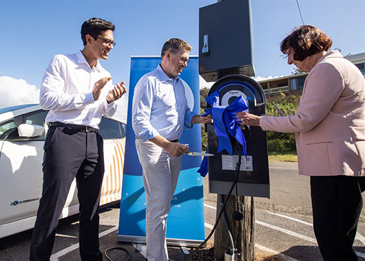 australian electric vehicle supply equipment brendan wheeler the hon pat conroy mp and lake macquarie mayor kay fraser unveil electric vehicle charger